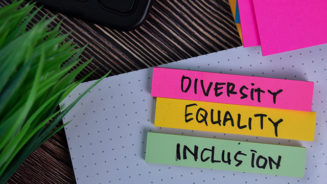 Diversity Equality Inclusion write on a sticky note isolated on Office Desk.